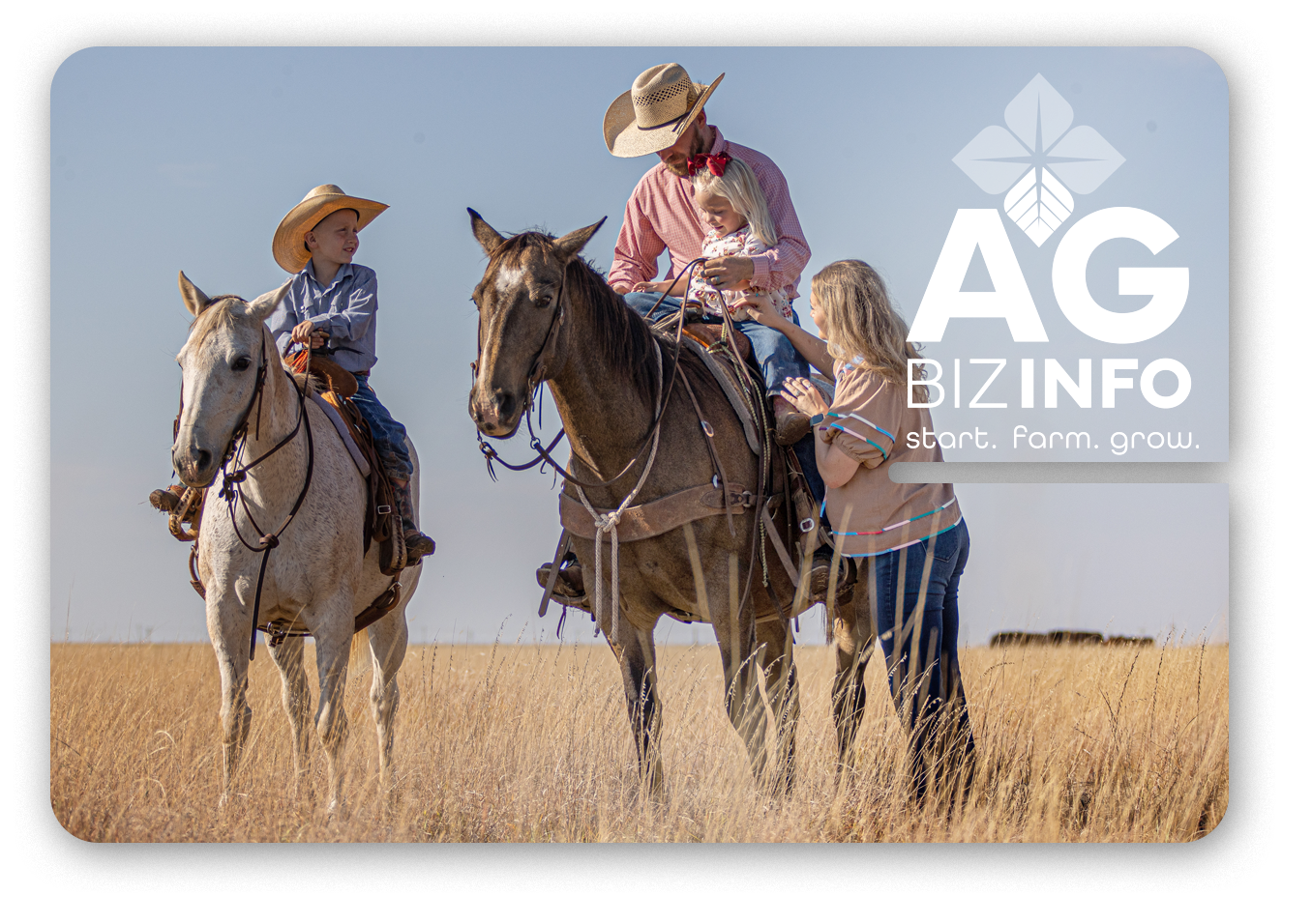 picture of a small boy with a cowboy hat on, sitting on a horse with his dad and sister sitting on another horse. The Mom is standing next to dad and daughter in a grassy field. A logo shows on the side that says, "AG Biz Info".